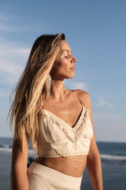 Woman wearing boho womens top in natural fabric